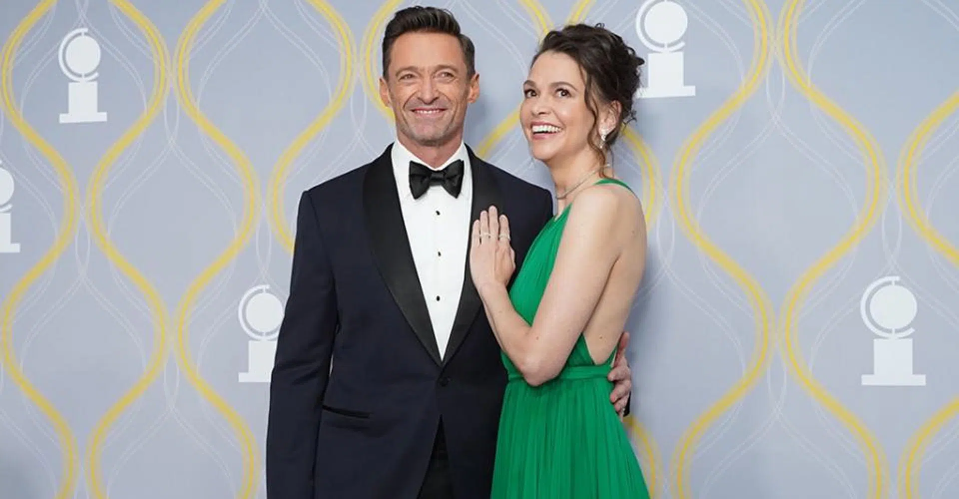 Hugh Jackman and Sutton Foster smiling on Broadway red carpet, Hugh Jackman Sutton Foster romance sparks buzz